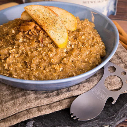 A bowl of maple oatmeal with apple slices